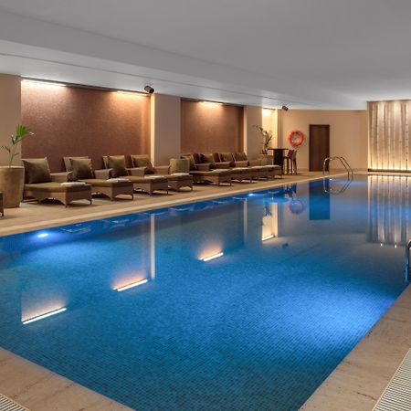 Doubletree By Hilton La Torre Golf Resort Рольдан Экстерьер фото The swimming pool at the hotel