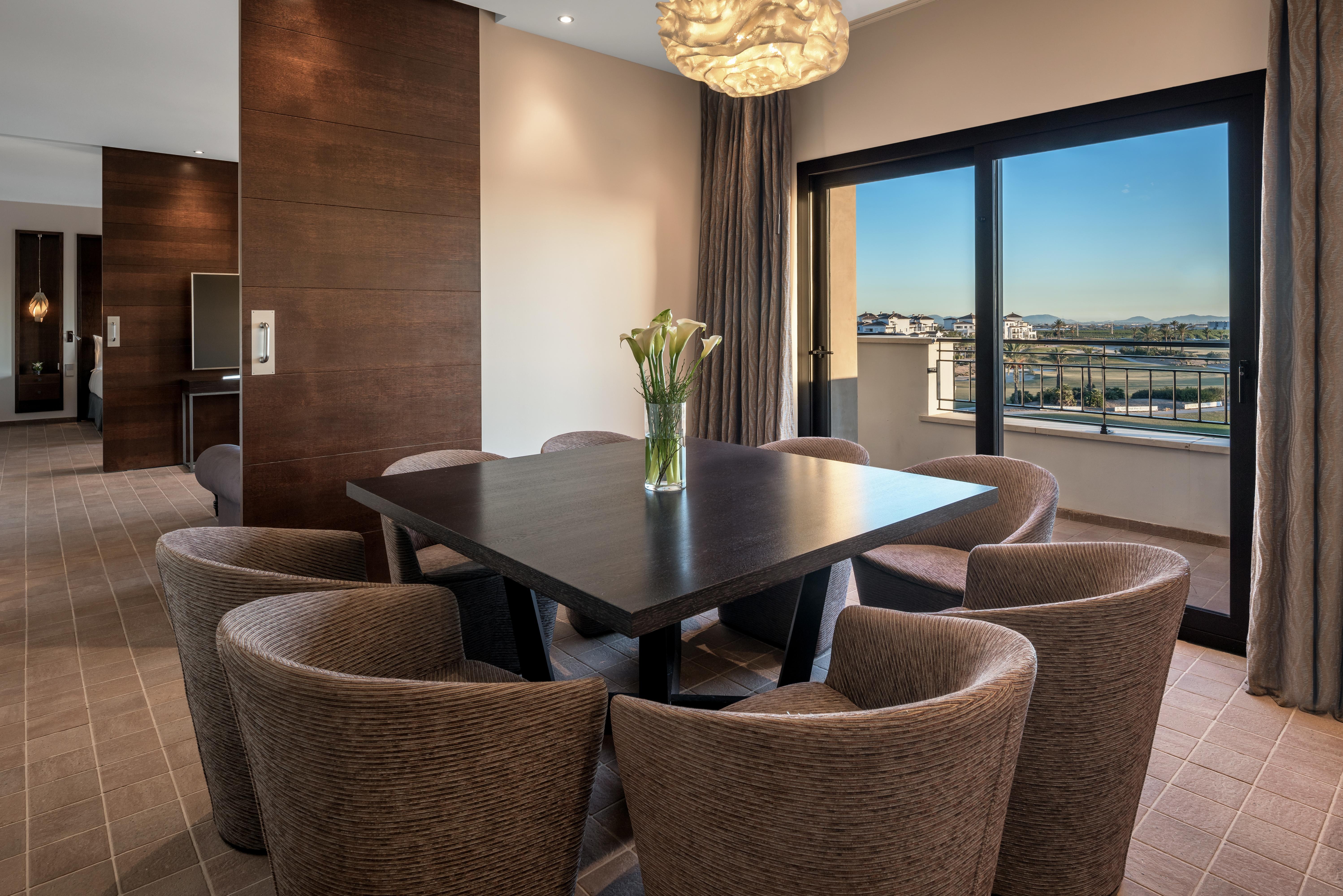 Doubletree By Hilton La Torre Golf Resort Рольдан Экстерьер фото A suite at the Hilton Athens