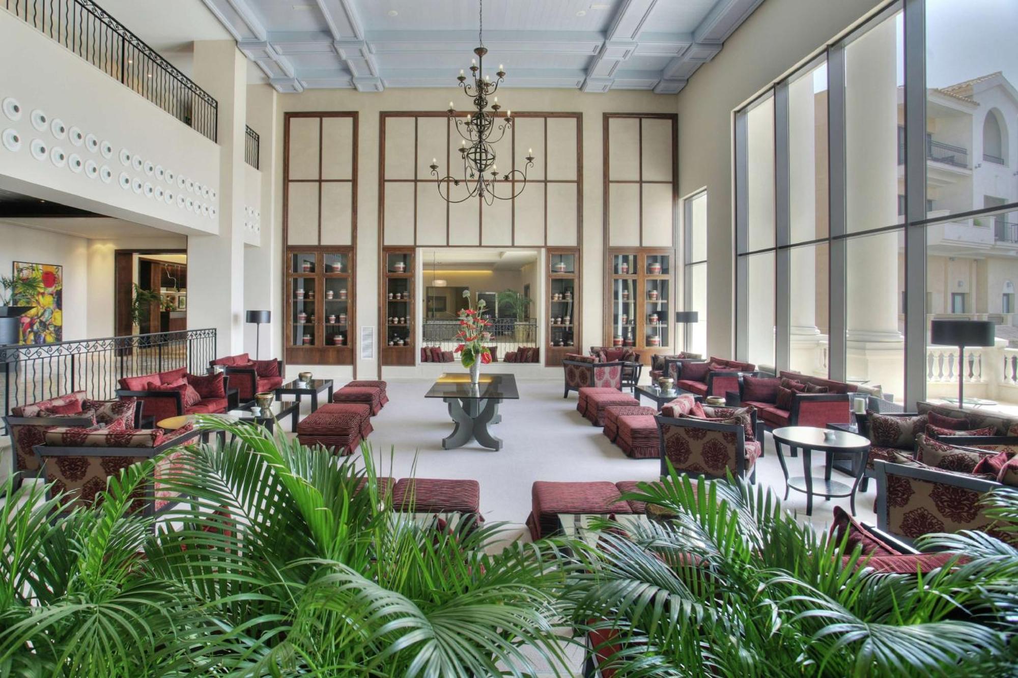 Doubletree By Hilton La Torre Golf Resort Рольдан Экстерьер фото The lobby of the hotel