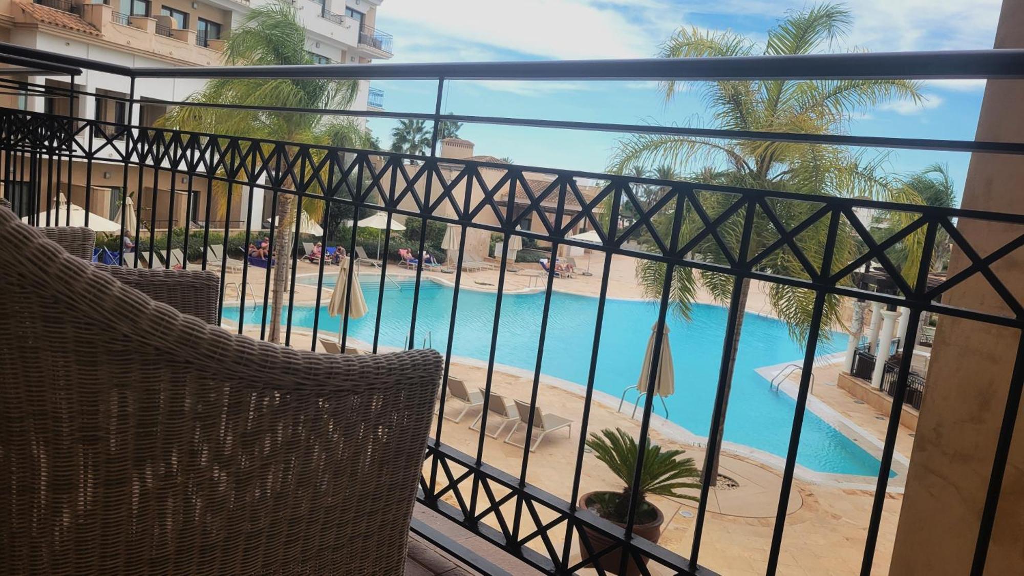 Doubletree By Hilton La Torre Golf Resort Рольдан Экстерьер фото View of the pool at the hotel